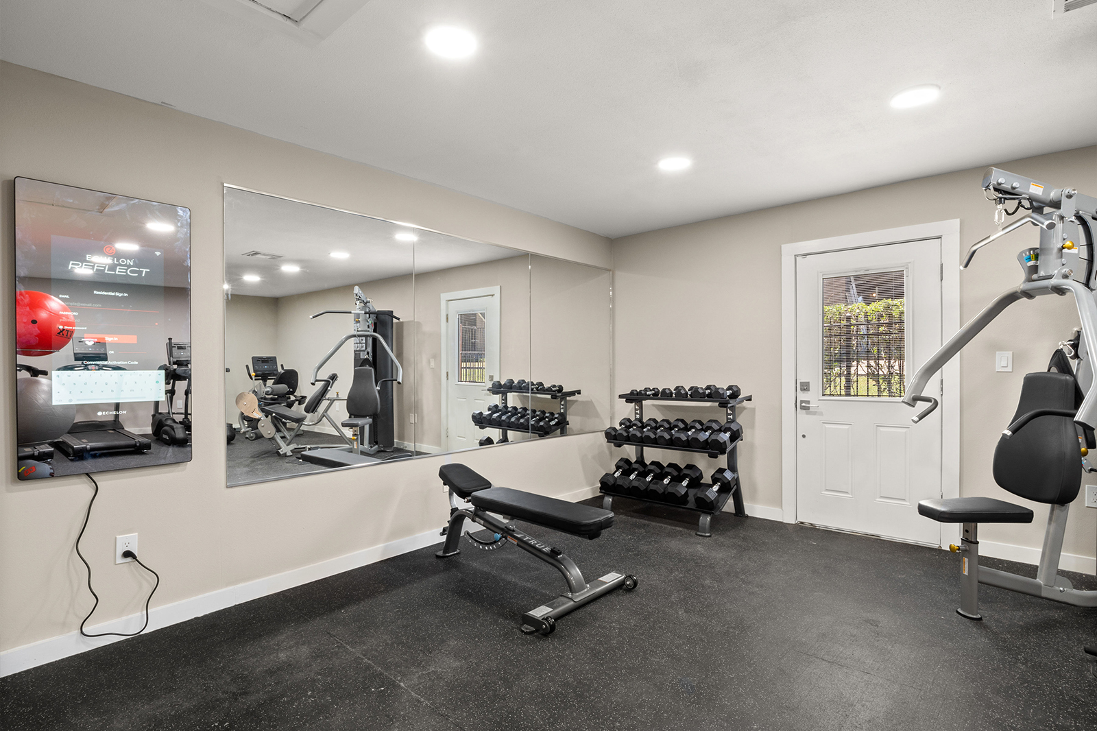 equipment and mirrors in the fitness center
